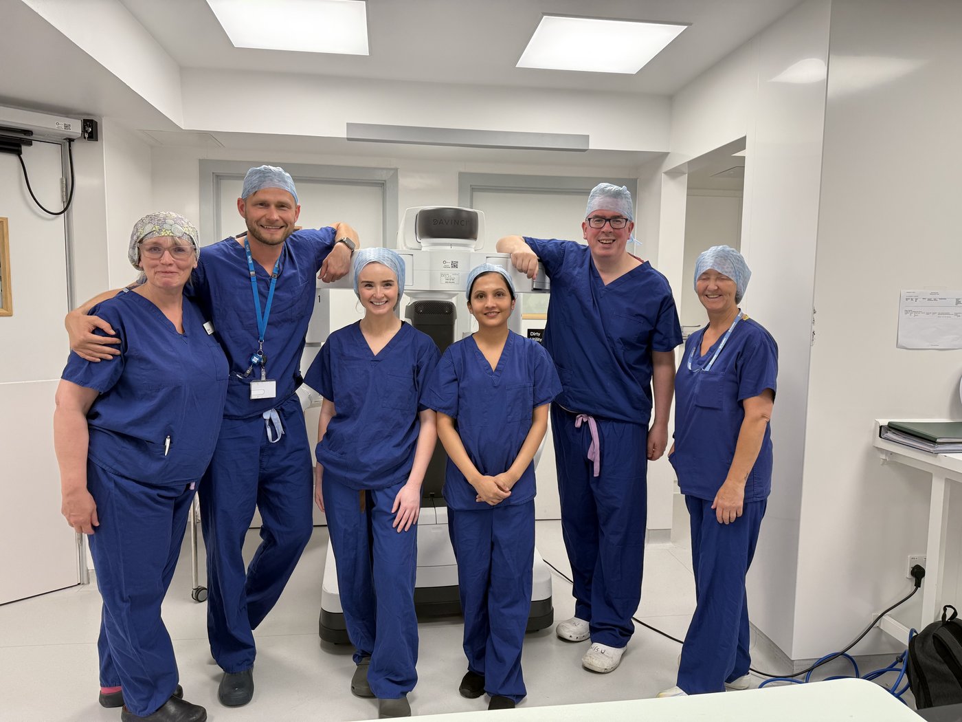 Robotic surgery team celebrating first rectus diastasis repair at Ross Hall